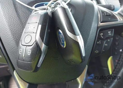 2015 Ford Edge Titanium z USA, uszkodzony, nr VIN 2FMTK4K88FBB10833